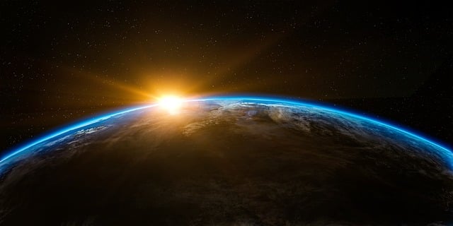 earth with light of sun behind it